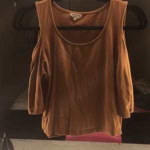 A mustard yellow crop top